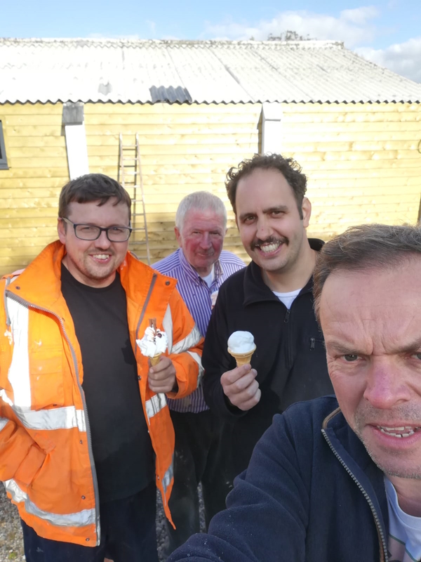The founders of FORT Builders' Merchant, enjoying an ice cream in the warm sun.